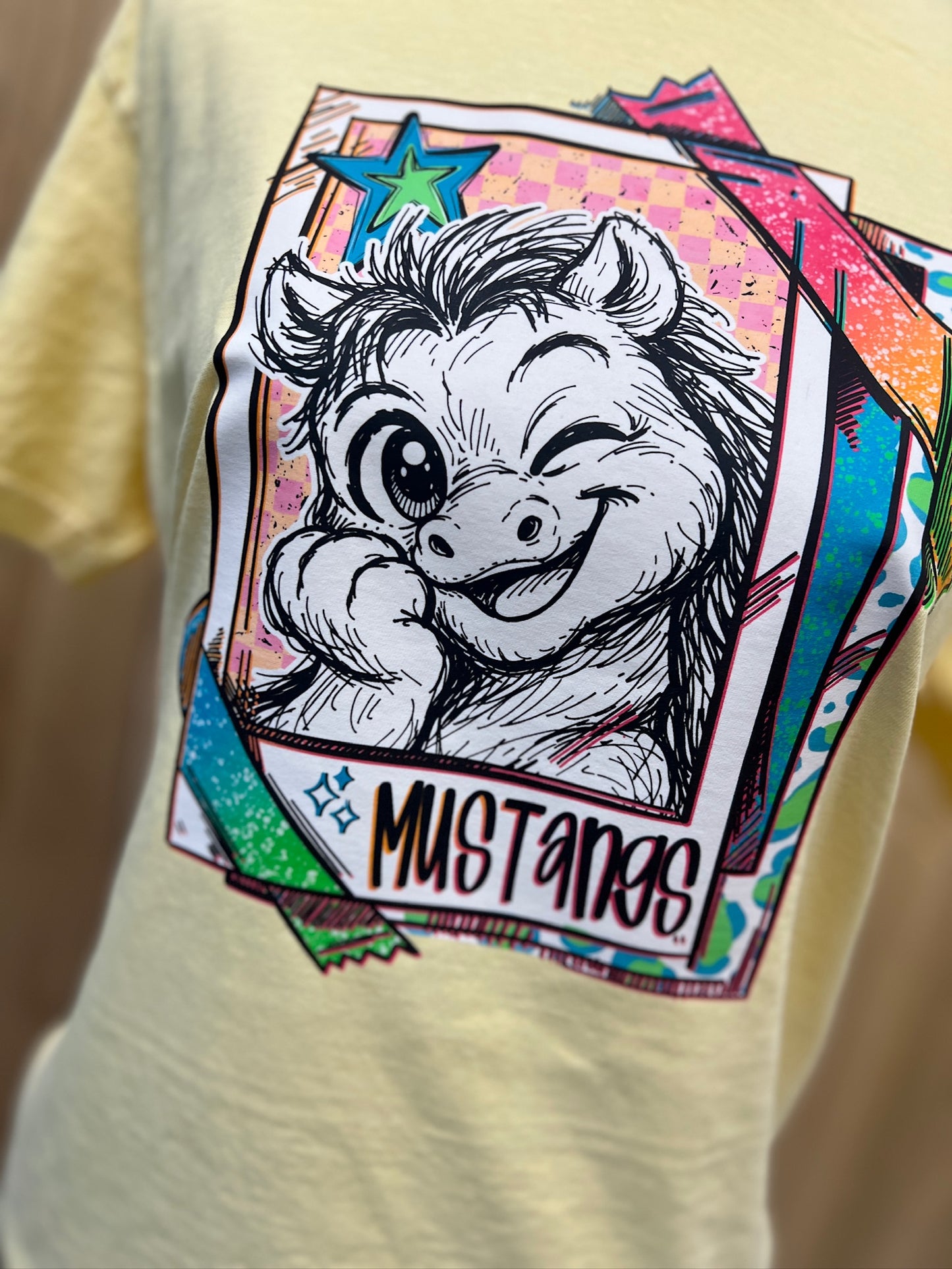 Cutie Mascot Mustangs on Comfort Colors (Shown on Butter)